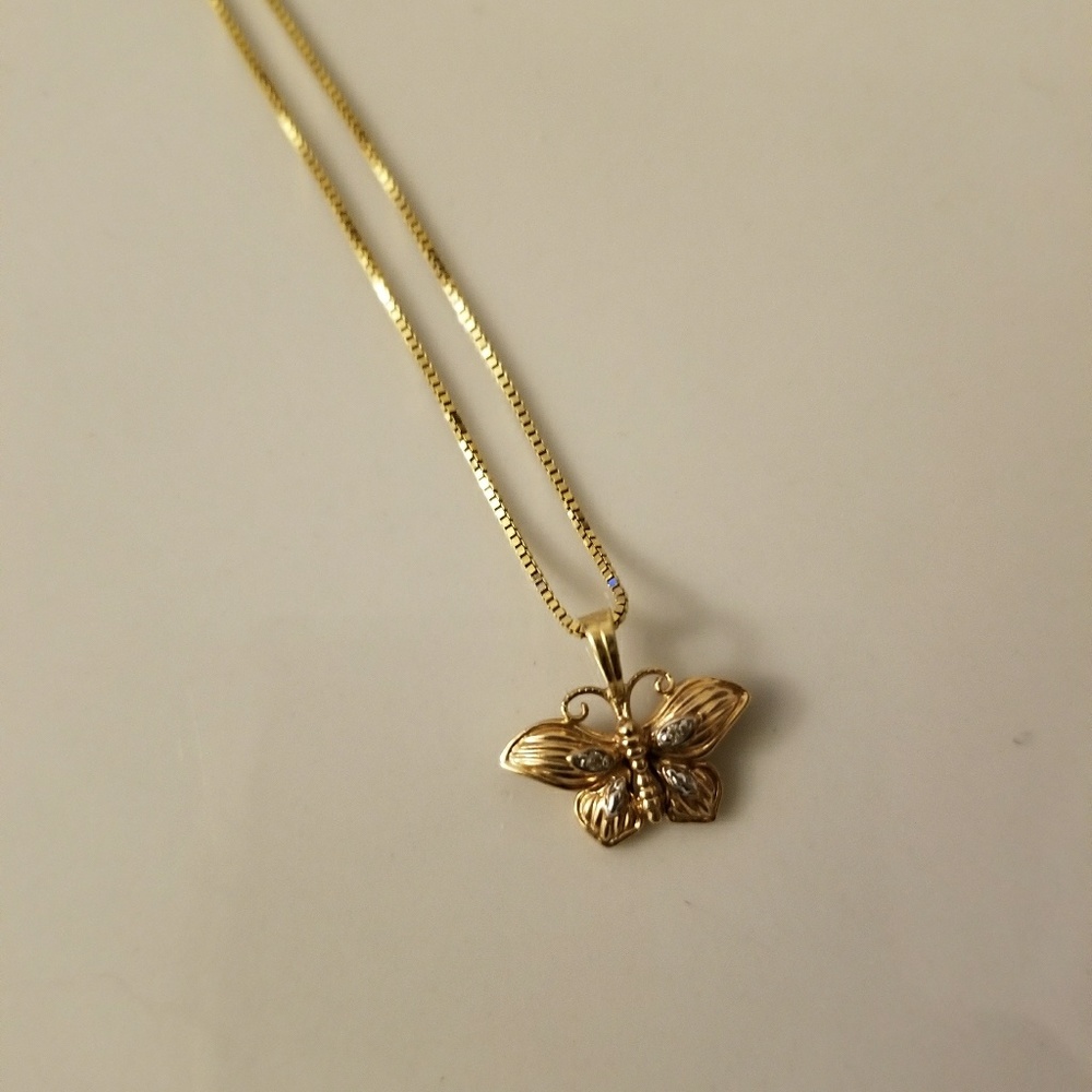 14k gold Butterfly with diamond accent